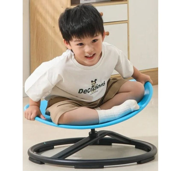 Little boy spinning around on the Spin Around Sensory Chair